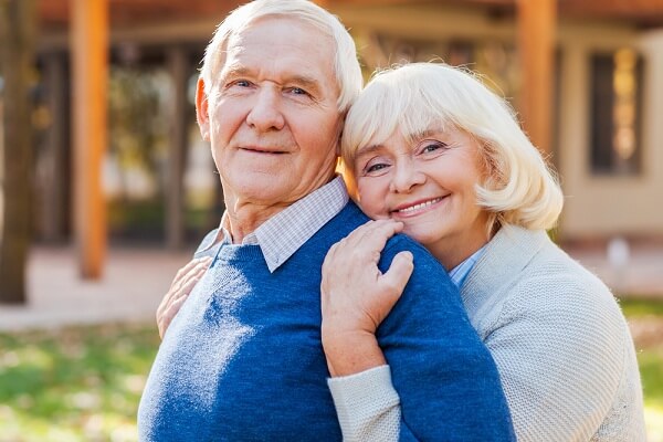 old couple feeling safe when eating healthy food